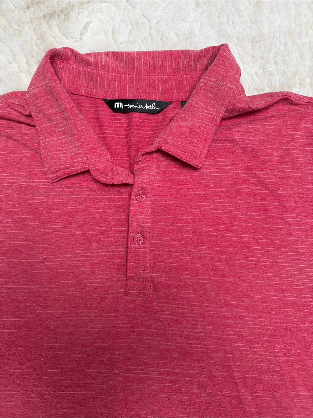 Travis Mathew Men's Heathered Raspberry Polo